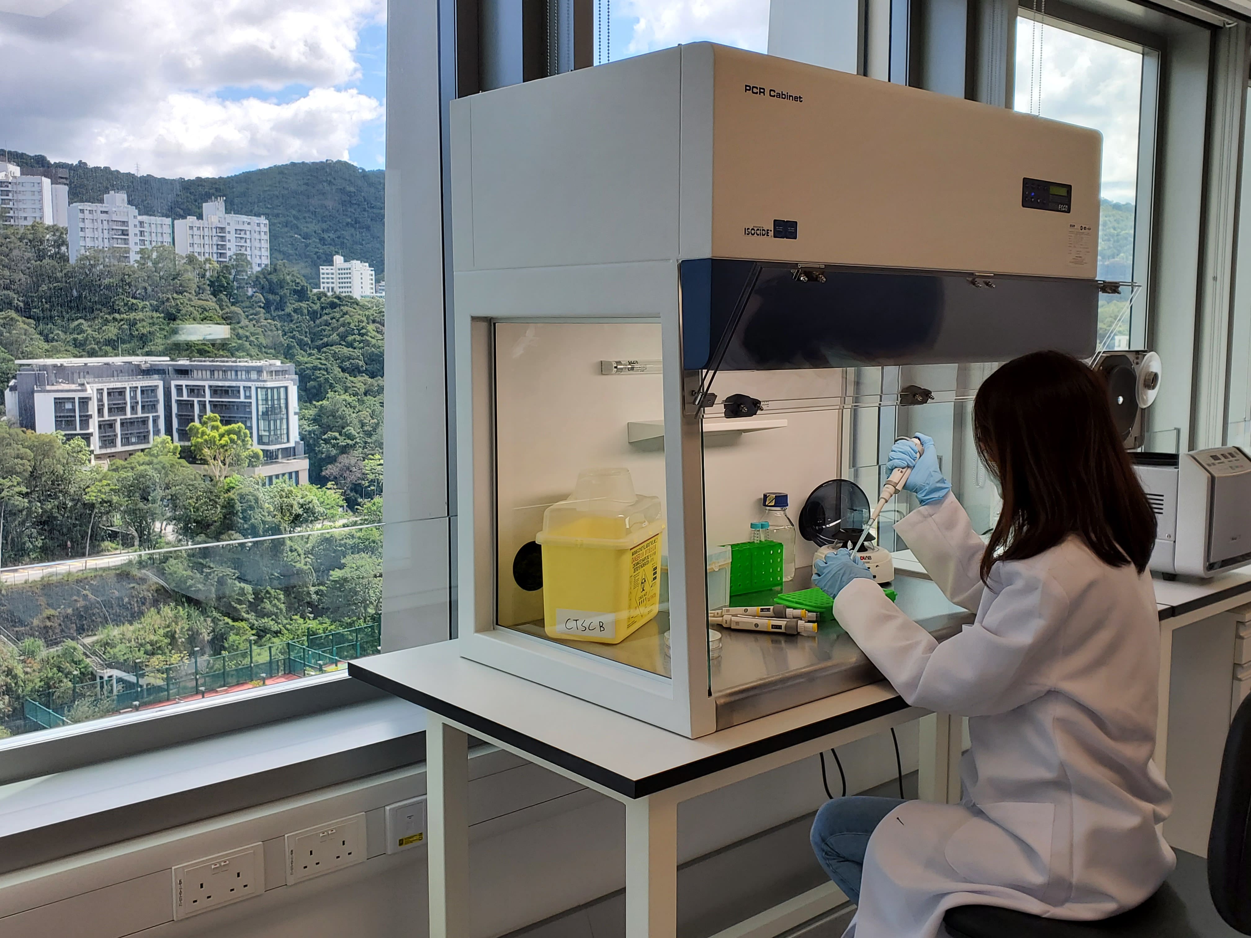 High Standard Pre-PCR Room - Centre staff working in the high standard pre-PCR room to ensure no contamination to the research sample